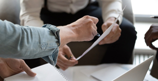 Man reviewing bankruptcy paperwork with a Licensed Insolvency Trustee